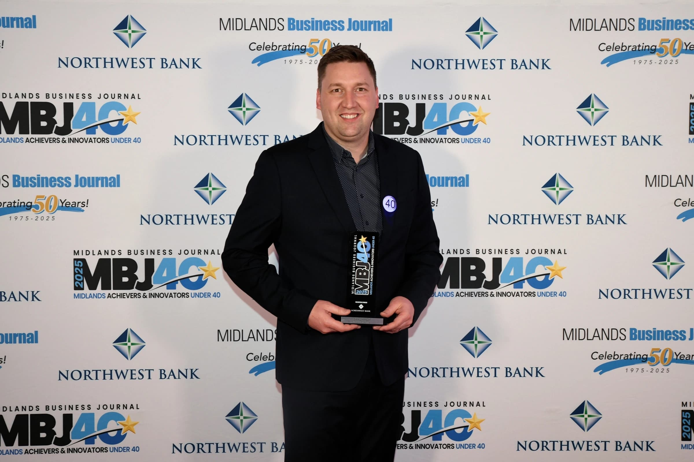 Evan Lamprecht Named to MBJ’s 2025 40 Under 40